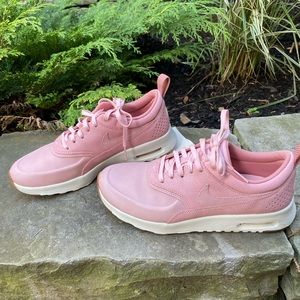 Pink Nike sneakers in size 6